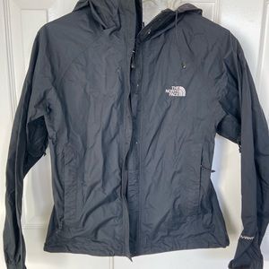 Like new! North Face rain jacket in XS.